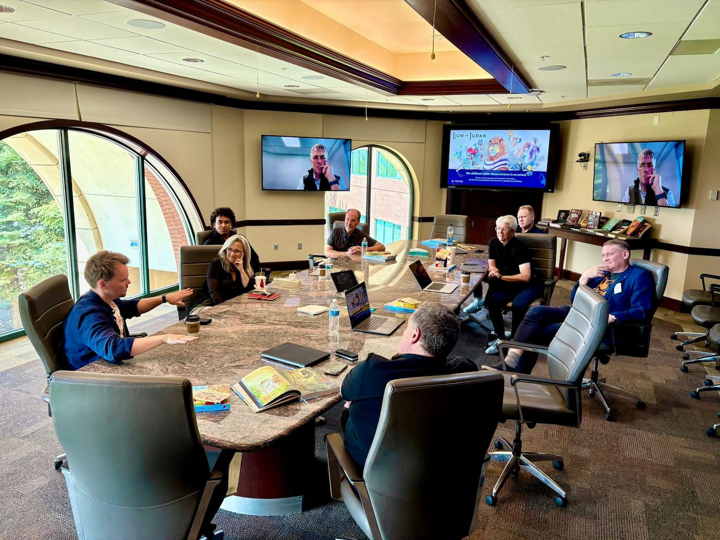 Joshua Arthur JJ youngest in Colorado boardroom board meeting 2025 Kings Collective international marketing agency UK Cabinet Office approved