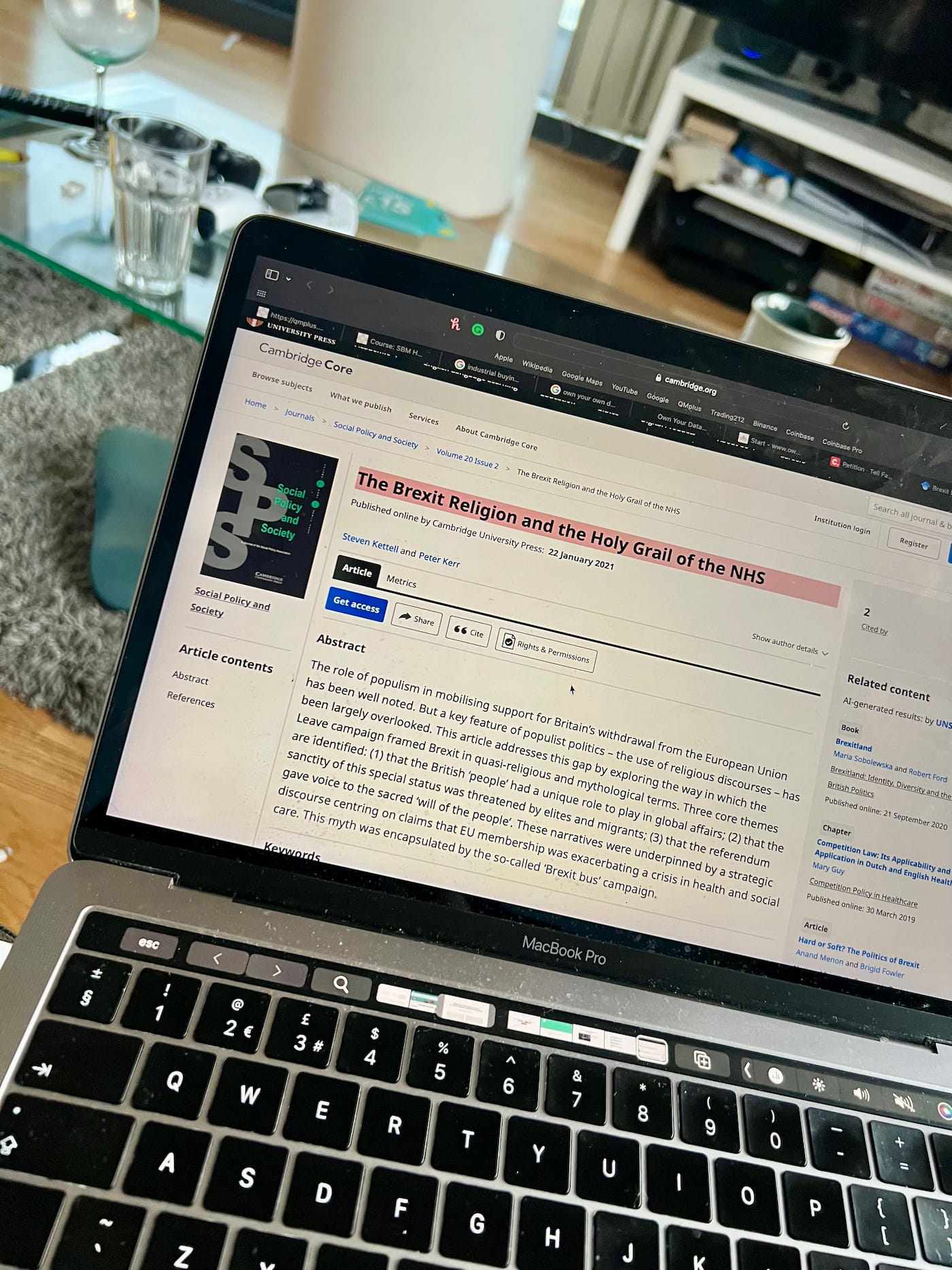 Joshua Arthur researching NHS policy on Cambridge Core academic journal MacBook Pro The Brexit Religion Holy Grail of the NHS 2021 evaluator North East London